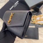 UPTOWN CHAIN WALLET IN CROCODILE-EMBOSSED SHINY LEATHER