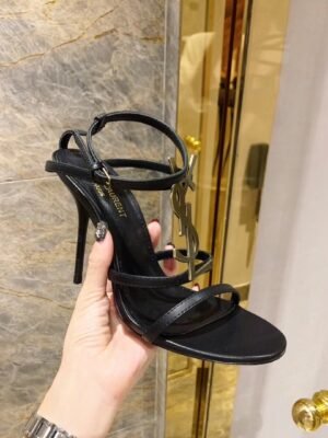 CASSANDRA FLAT SANDALS IN CROCODILE-EMBOSSED LEATHER WITH GOLD-TONE MONOGRAM