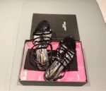 CASSANDRA FLAT SANDALS IN CROCODILE-EMBOSSED LEATHER WITH GOLD-TONE MONOGRAM