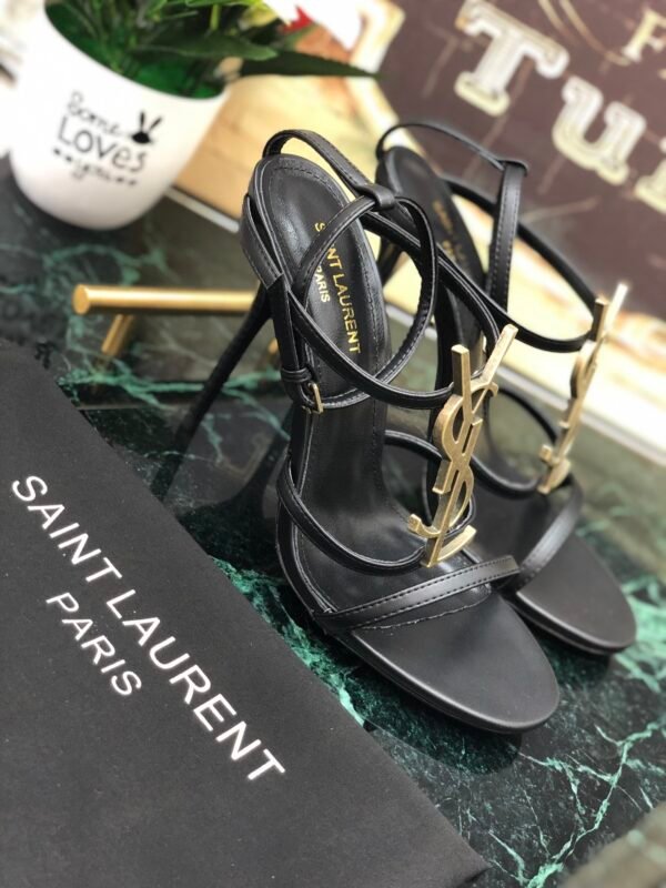 CASSANDRA FLAT SANDALS IN CROCODILE-EMBOSSED LEATHER WITH GOLD-TONE MONOGRAM