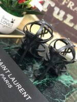 CASSANDRA FLAT SANDALS IN CROCODILE-EMBOSSED LEATHER WITH GOLD-TONE MONOGRAM