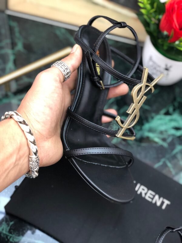 CASSANDRA FLAT SANDALS IN CROCODILE-EMBOSSED LEATHER WITH GOLD-TONE MONOGRAM