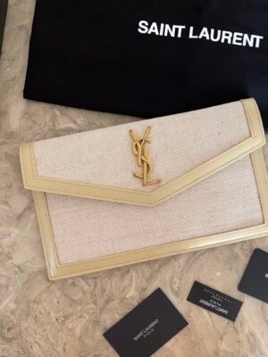 UPTOWN POUCH IN CANVAS AND SMOOTH LEATHER