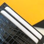 CASSANDRE MATELASSÉ CARD CASE IN GRAIN DE POUDRE EMBOSSED LEATHER