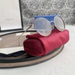 Chloé Eyewear engraved-logo round-frame sunglasses