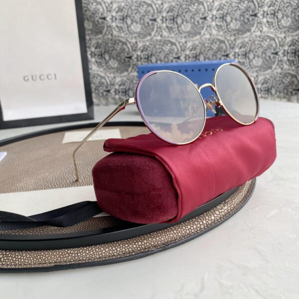 Chloé Eyewear engraved-logo round-frame sunglasses