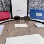 Chloé Eyewear engraved-logo round-frame sunglasses