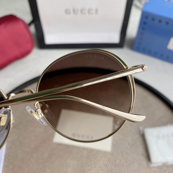 Chloé Eyewear engraved-logo round-frame sunglasses