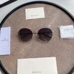 Chloé Eyewear engraved-logo round-frame sunglasses