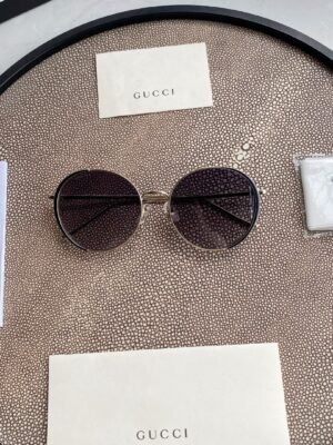 Chloé Eyewear engraved-logo round-frame sunglasses