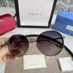 Chloé Eyewear engraved-logo round-frame sunglasses