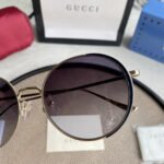 Chloé Eyewear engraved-logo round-frame sunglasses