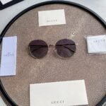 Chloé Eyewear engraved-logo round-frame sunglasses