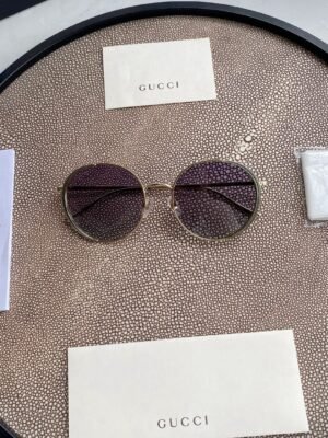 Chloé Eyewear engraved-logo round-frame sunglasses