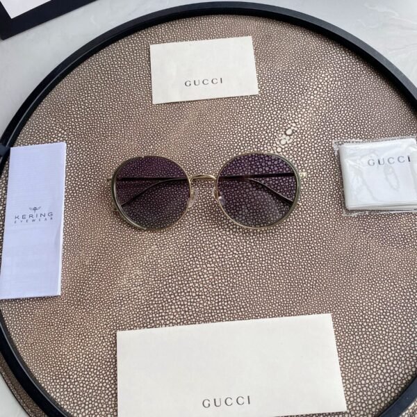 Chloé Eyewear engraved-logo round-frame sunglasses