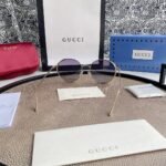 Chloé Eyewear engraved-logo round-frame sunglasses