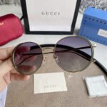 Chloé Eyewear engraved-logo round-frame sunglasses