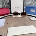 Chloé Eyewear engraved-logo round-frame sunglasses