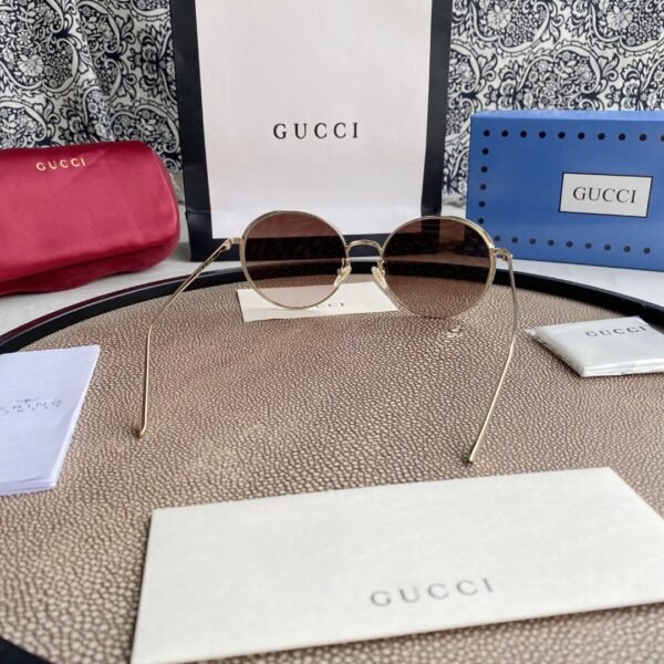 Chloé Eyewear engraved-logo round-frame sunglasses