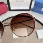 Chloé Eyewear engraved-logo round-frame sunglasses