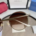 Chloé Eyewear engraved-logo round-frame sunglasses