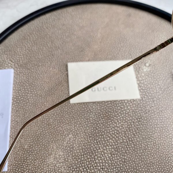 Chloé Eyewear engraved-logo round-frame sunglasses