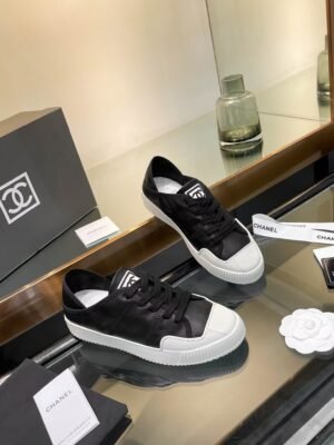 Chanel CASUAL SHOES IN BLACK MIX WHITE LAMBSKIN