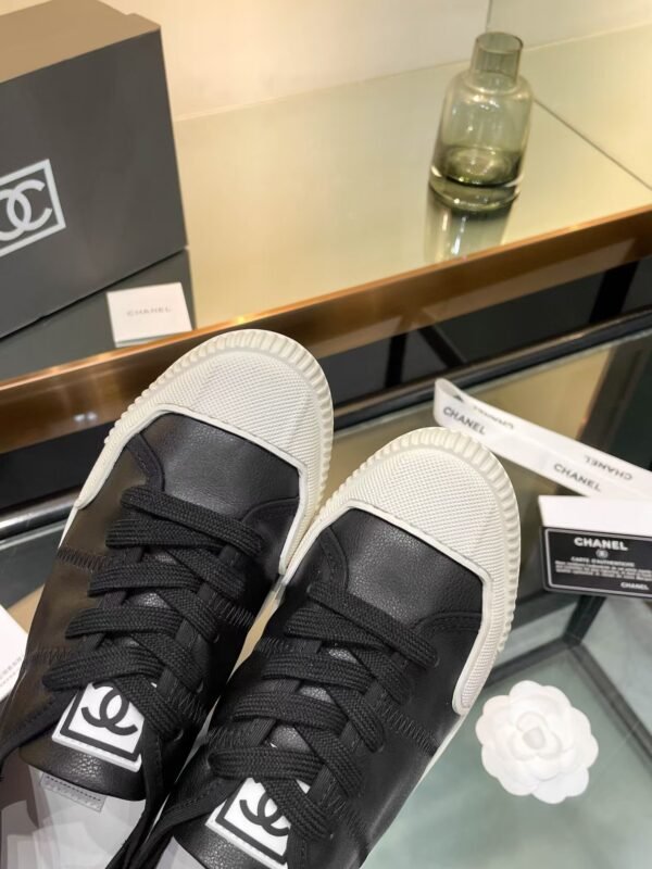 Chanel CASUAL SHOES IN BLACK MIX WHITE LAMBSKIN