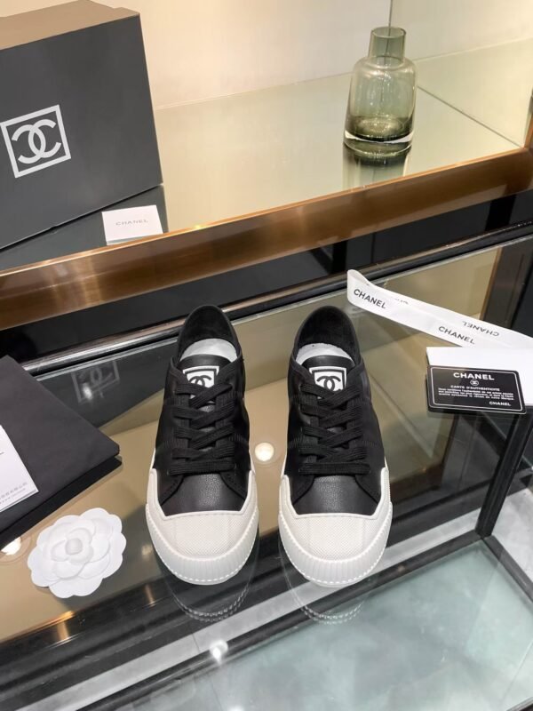 Chanel CASUAL SHOES IN BLACK MIX WHITE LAMBSKIN