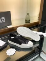 Chanel CASUAL SHOES IN BLACK MIX WHITE LAMBSKIN