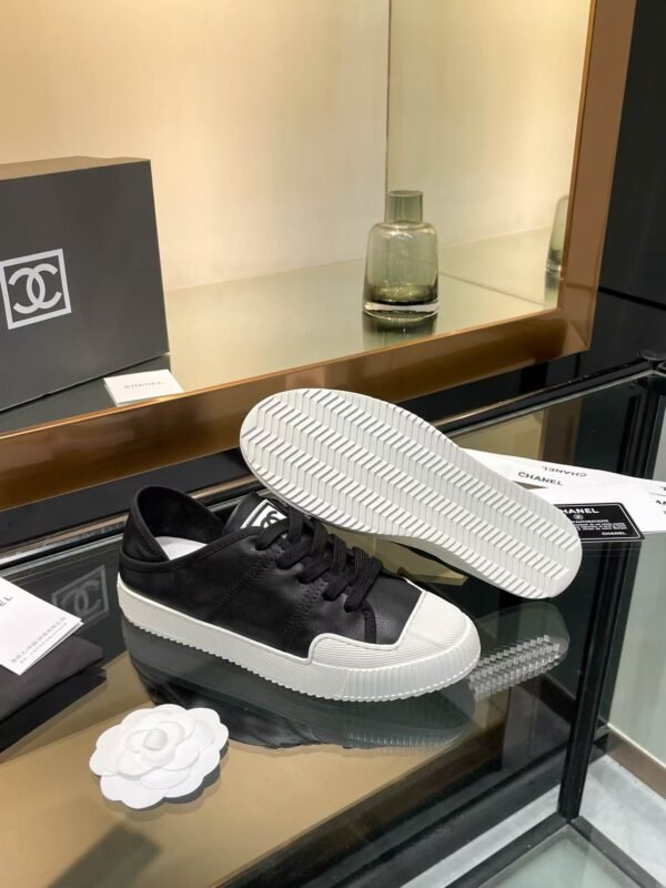 Chanel CASUAL SHOES IN BLACK MIX WHITE LAMBSKIN