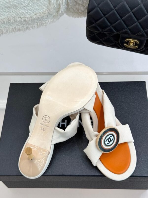 Chanel Cross Strap Mules with Oversized Double C Buckle