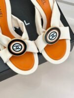 Chanel Cross Strap Mules with Oversized Double C Buckle