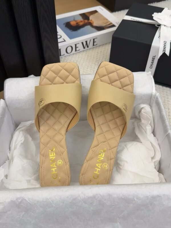 CHANEL Lambskin Quilted CC Mules